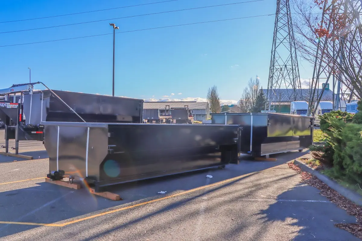 Roll-off dumpster ready for waste disposal at job site for Concrete Dumpster Rental in Vermilion